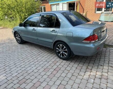 Зеленый Мицубиси Лансер, объемом двигателя 1.6 л и пробегом 137 тыс. км за 5500 $, фото 6 на Automoto.ua