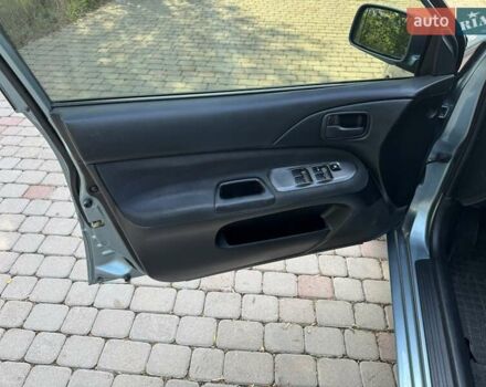 Зеленый Мицубиси Лансер, объемом двигателя 1.6 л и пробегом 137 тыс. км за 5500 $, фото 23 на Automoto.ua