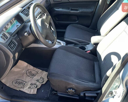 Зеленый Мицубиси Лансер, объемом двигателя 1.58 л и пробегом 180 тыс. км за 4800 $, фото 8 на Automoto.ua