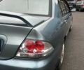 Зеленый Мицубиси Лансер, объемом двигателя 1.6 л и пробегом 234 тыс. км за 5300 $, фото 4 на Automoto.ua