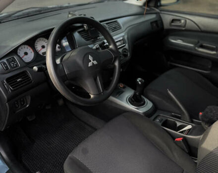 Зелений Міцубісі Lancer, об'ємом двигуна 1.6 л та пробігом 164 тис. км за 6000 $, фото 9 на Automoto.ua