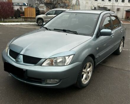 Зеленый Мицубиси Лансер, объемом двигателя 1.6 л и пробегом 234 тыс. км за 5300 $, фото 2 на Automoto.ua