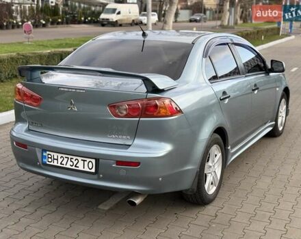 Зеленый Мицубиси Лансер, объемом двигателя 2 л и пробегом 177 тыс. км за 7200 $, фото 7 на Automoto.ua