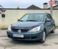 Зеленый Мицубиси Лансер, объемом двигателя 1.6 л и пробегом 259 тыс. км за 3999 $, фото 1 на Automoto.ua