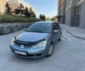 Зеленый Мицубиси Лансер, объемом двигателя 1.6 л и пробегом 300 тыс. км за 4000 $, фото 1 на Automoto.ua
