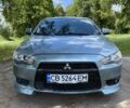 Зеленый Мицубиси Лансер, объемом двигателя 2 л и пробегом 241 тыс. км за 5200 $, фото 1 на Automoto.ua