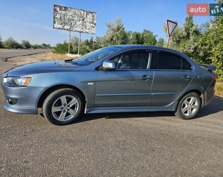 Зелений Міцубісі Lancer, об'ємом двигуна 1.47 л та пробігом 215 тис. км за 5000 $, фото 7 на Automoto.ua