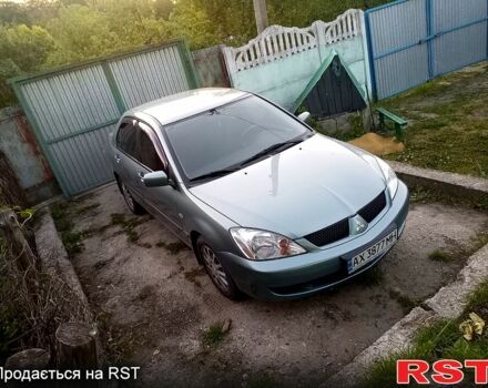 Зеленый Мицубиси Лансер, объемом двигателя 1.6 л и пробегом 176 тыс. км за 4800 $, фото 1 на Automoto.ua