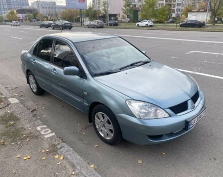 Зеленый Мицубиси Лансер, объемом двигателя 1.6 л и пробегом 167 тыс. км за 3500 $, фото 2 на Automoto.ua