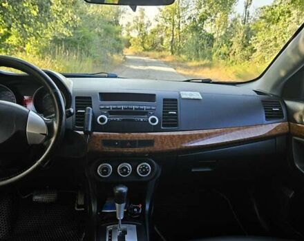 Зелений Міцубісі Lancer, об'ємом двигуна 1.47 л та пробігом 215 тис. км за 5000 $, фото 17 на Automoto.ua