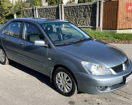 Зеленый Мицубиси Лансер, объемом двигателя 1.58 л и пробегом 180 тыс. км за 4800 $, фото 1 на Automoto.ua