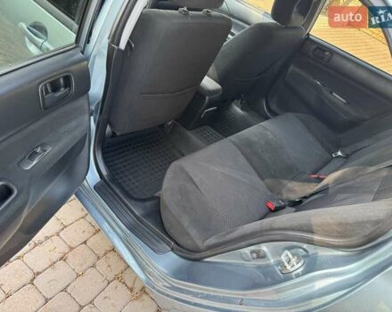 Зеленый Мицубиси Лансер, объемом двигателя 1.6 л и пробегом 137 тыс. км за 5500 $, фото 21 на Automoto.ua