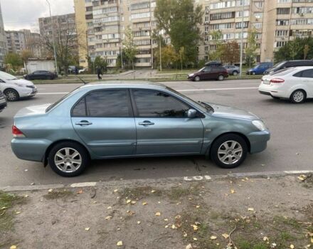 Зеленый Мицубиси Лансер, объемом двигателя 1.6 л и пробегом 167 тыс. км за 3500 $, фото 4 на Automoto.ua