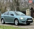 Зелений Міцубісі Lancer, об'ємом двигуна 2 л та пробігом 135 тис. км за 5700 $, фото 8 на Automoto.ua