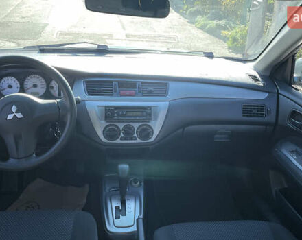 Зеленый Мицубиси Лансер, объемом двигателя 1.58 л и пробегом 180 тыс. км за 4800 $, фото 6 на Automoto.ua