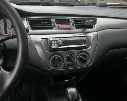 Зеленый Мицубиси Лансер, объемом двигателя 1.6 л и пробегом 234 тыс. км за 5300 $, фото 6 на Automoto.ua