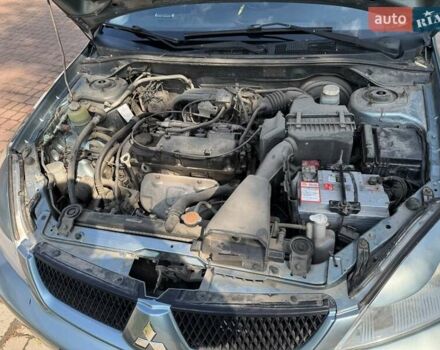 Зеленый Мицубиси Лансер, объемом двигателя 1.6 л и пробегом 137 тыс. км за 5500 $, фото 27 на Automoto.ua