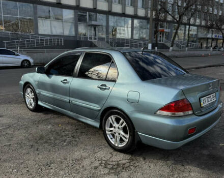 Зелений Міцубісі Lancer, об'ємом двигуна 1.6 л та пробігом 164 тис. км за 6000 $, фото 1 на Automoto.ua