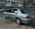 Зелений Міцубісі Lancer, об'ємом двигуна 1.6 л та пробігом 164 тис. км за 6000 $, фото 1 на Automoto.ua