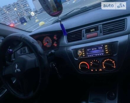 Зелений Міцубісі Lancer, об'ємом двигуна 1.6 л та пробігом 325 тис. км за 4200 $, фото 17 на Automoto.ua