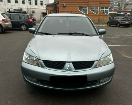 Зеленый Мицубиси Лансер, объемом двигателя 1.6 л и пробегом 234 тыс. км за 5300 $, фото 1 на Automoto.ua