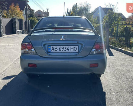 Зеленый Мицубиси Лансер, объемом двигателя 1.58 л и пробегом 180 тыс. км за 4800 $, фото 4 на Automoto.ua