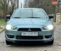 Зелений Міцубісі Lancer, об'ємом двигуна 2 л та пробігом 135 тис. км за 5700 $, фото 2 на Automoto.ua