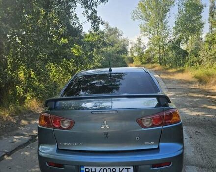 Зелений Міцубісі Lancer, об'ємом двигуна 1.47 л та пробігом 215 тис. км за 5000 $, фото 10 на Automoto.ua