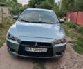 Зеленый Мицубиси Лансер, объемом двигателя 1.5 л и пробегом 235 тыс. км за 5000 $, фото 1 на Automoto.ua