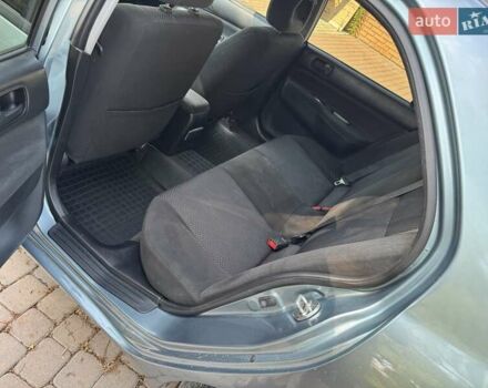 Зеленый Мицубиси Лансер, объемом двигателя 1.6 л и пробегом 137 тыс. км за 5500 $, фото 22 на Automoto.ua