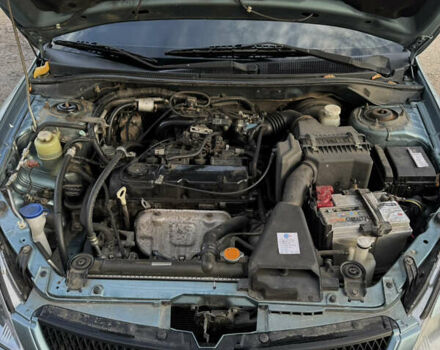 Зелений Міцубісі Lancer, об'ємом двигуна 1.6 л та пробігом 164 тис. км за 6000 $, фото 12 на Automoto.ua