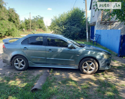 Зелений Міцубісі Lancer, об'ємом двигуна 1.9 л та пробігом 204 тис. км за 7000 $, фото 3 на Automoto.ua