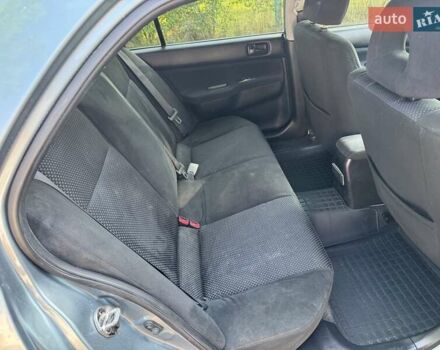 Зеленый Мицубиси Лансер, объемом двигателя 1.6 л и пробегом 137 тыс. км за 5500 $, фото 19 на Automoto.ua