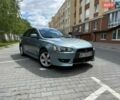 Зеленый Мицубиси Лансер, объемом двигателя 2 л и пробегом 251 тыс. км за 5500 $, фото 1 на Automoto.ua