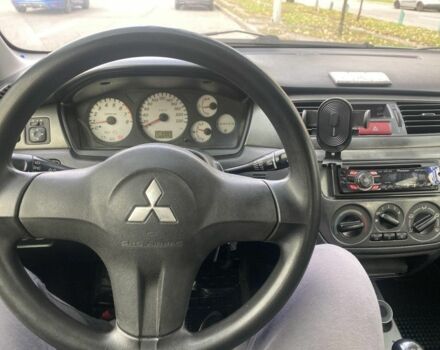 Зеленый Мицубиси Лансер, объемом двигателя 1.6 л и пробегом 167 тыс. км за 3500 $, фото 7 на Automoto.ua