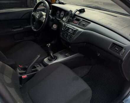 Зелений Міцубісі Lancer, об'ємом двигуна 1.6 л та пробігом 164 тис. км за 6000 $, фото 7 на Automoto.ua
