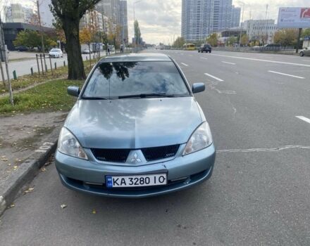 Зеленый Мицубиси Лансер, объемом двигателя 1.6 л и пробегом 167 тыс. км за 3500 $, фото 1 на Automoto.ua