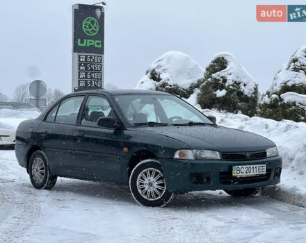 Зеленый Мицубиси Лансер, объемом двигателя 1.3 л и пробегом 260 тыс. км за 1899 $, фото 1 на Automoto.ua