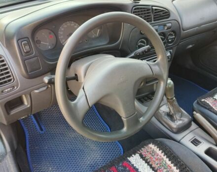 Зеленый Мицубиси Лансер, объемом двигателя 1.3 л и пробегом 500 тыс. км за 1800 $, фото 1 на Automoto.ua