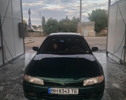 Зеленый Мицубиси Лансер, объемом двигателя 1.3 л и пробегом 400 тыс. км за 2300 $, фото 1 на Automoto.ua