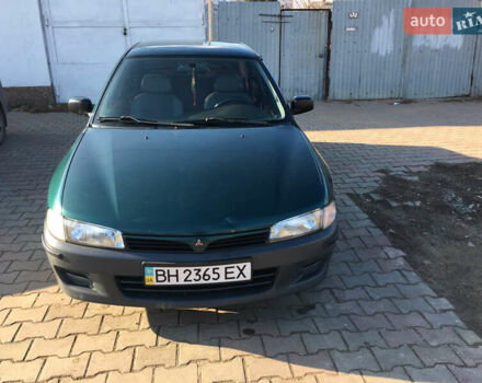 Зелений Міцубісі Lancer, об'ємом двигуна 1.3 л та пробігом 235 тис. км за 2300 $, фото 1 на Automoto.ua