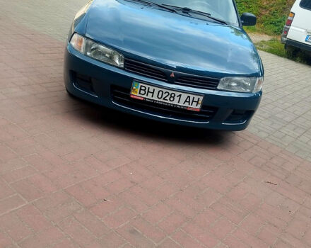Зелений Міцубісі Lancer, об'ємом двигуна 1.3 л та пробігом 300 тис. км за 1550 $, фото 1 на Automoto.ua