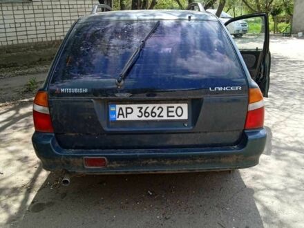 Мицубиси Лансер 1997 в Васильковке на Automoto.ua Зеленый Мицубиси Лансер, объемом двигателя 1.6 л и пробегом 100 тыс. км за 500 $, фото 1 на Automoto.ua