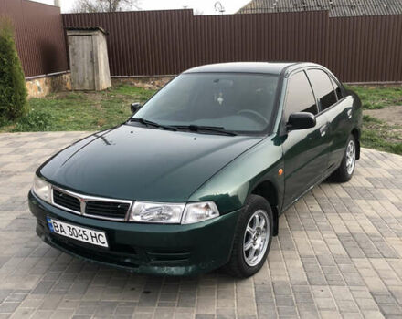 Зелений Міцубісі Lancer, об'ємом двигуна 1.3 л та пробігом 320 тис. км за 2500 $, фото 1 на Automoto.ua