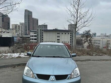 Зеленый Мицубиси Лансер, объемом двигателя 1.58 л и пробегом 207 тыс. км за 4200 $, фото 1 на Automoto.ua