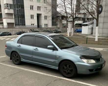 Зеленый Мицубиси Лансер, объемом двигателя 1.6 л и пробегом 215 тыс. км за 3500 $, фото 1 на Automoto.ua