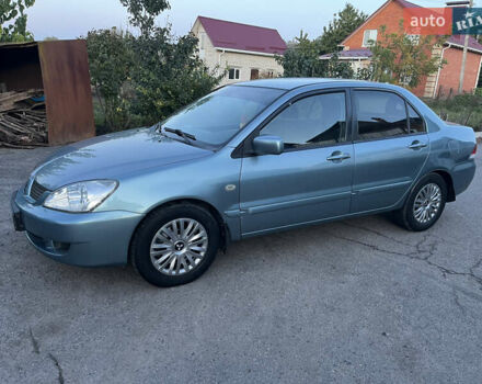 Зелений Міцубісі Lancer, об'ємом двигуна 1.6 л та пробігом 252 тис. км за 3650 $, фото 1 на Automoto.ua
