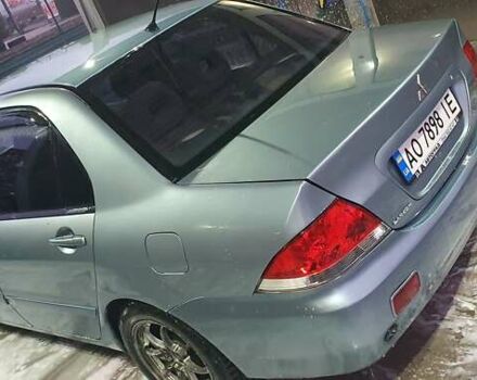 Зелений Міцубісі Lancer, об'ємом двигуна 1.58 л та пробігом 352 тис. км за 3700 $, фото 1 на Automoto.ua