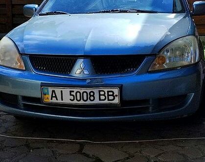 Зелений Міцубісі Lancer, об'ємом двигуна 1.6 л та пробігом 0 тис. км за 2999 $, фото 1 на Automoto.ua
