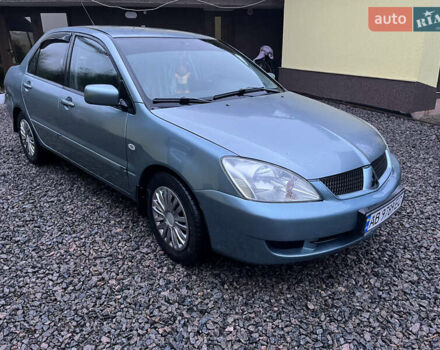 Зелений Міцубісі Lancer, об'ємом двигуна 1.58 л та пробігом 252 тис. км за 3650 $, фото 1 на Automoto.ua